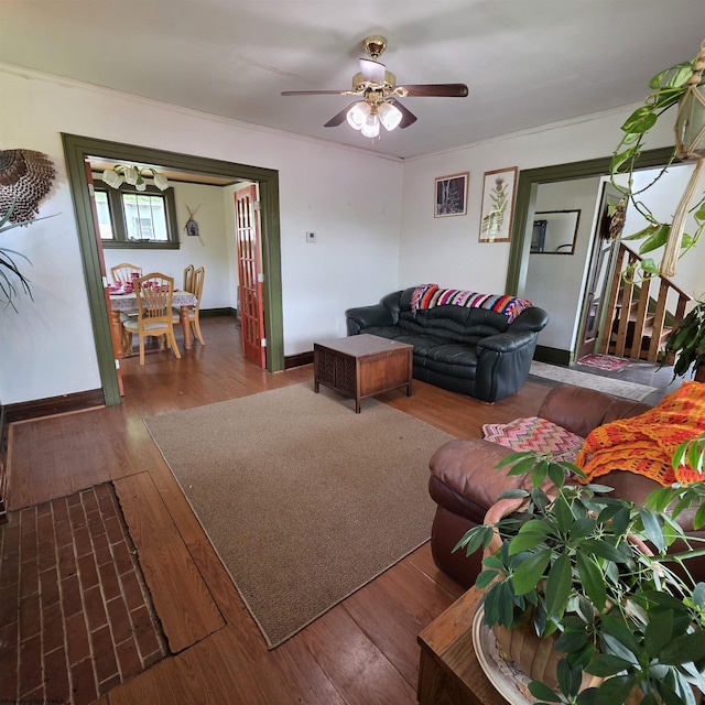 147 E 6th St, Weston, WV 26452 - living area featuring a ceiling fan, wood finished floors, baseboards, and crown molding