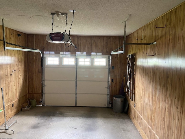 1730 S Davis Ave, Elkins, WV 26241 - garage featuring wooden walls and a garage door opener