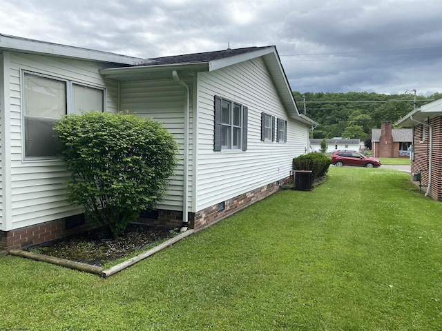 1730 S Davis Ave, Elkins, WV 26241 - view of home's exterior with crawl space, a yard, and central AC unit