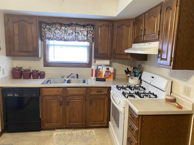 1730 S Davis Ave, Elkins, WV 26241 - kitchen featuring black dishwasher, white gas stove, under cabinet range hood, a sink, and light countertops