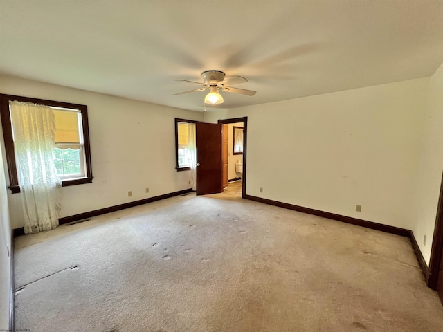 200 Heckle Ln, Elkins, WV 26241 - empty room with plenty of natural light, light carpet, and a ceiling fan