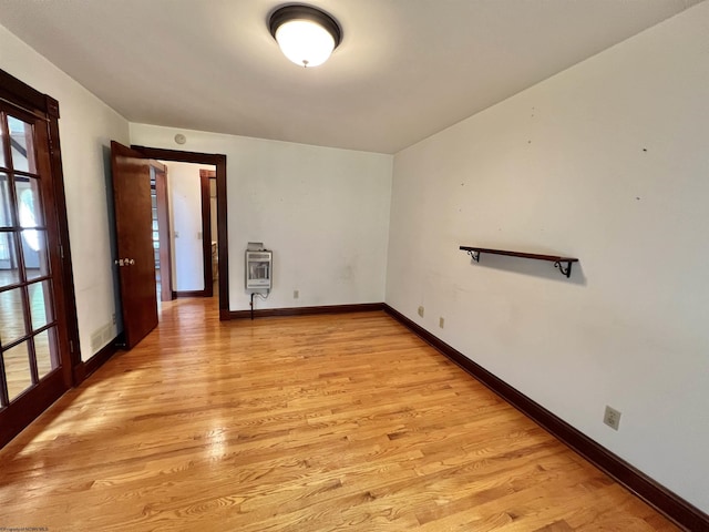 200 Heckle Ln, Elkins, WV 26241 - spare room with heating unit and light wood-type flooring