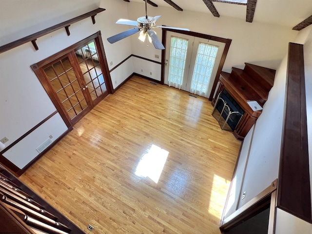 200 Heckle Ln, Elkins, WV 26241 - unfurnished living room with light wood-type flooring, french doors, and a ceiling fan
