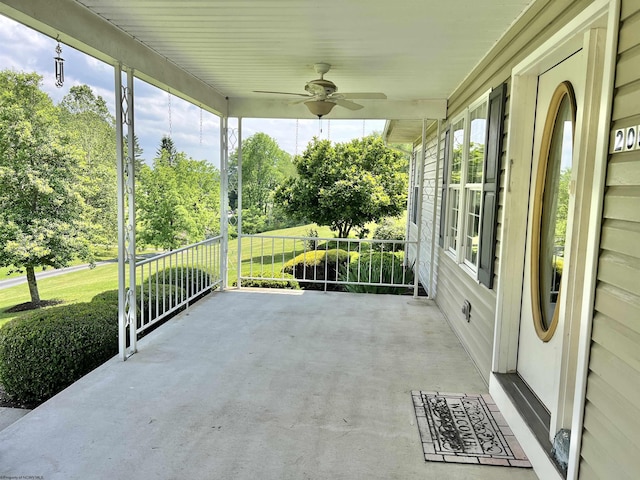 200 Heckle Ln, Elkins, WV 26241 - covered porch with ceiling fan and view of scattered trees