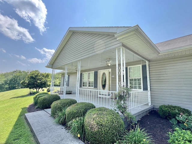 200 Heckle Ln, Elkins, WV 26241 - view of home's exterior with a porch, a ceiling fan, and a yard
