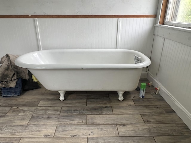 115 Walnut St, Rowlesburg, WV 26425 - bathroom with a freestanding bath and wood finished floors