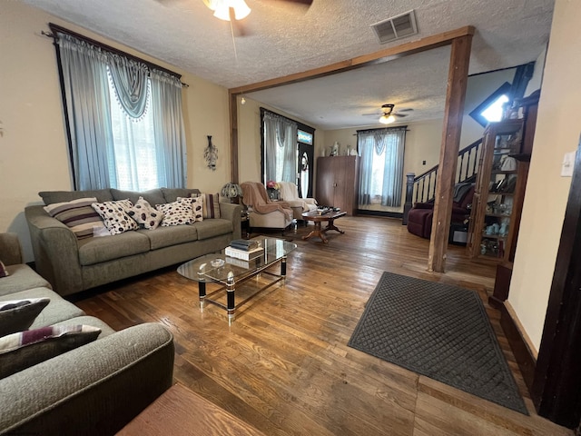 115 Walnut St, Rowlesburg, WV 26425 - living room with ceiling fan, a textured ceiling, stairway, and wood finished floors