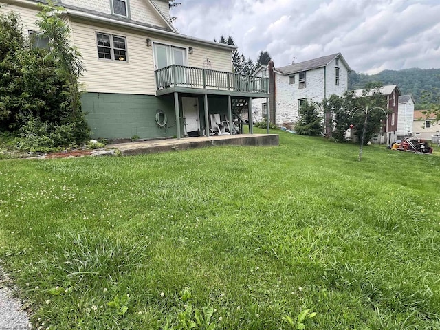 115 Walnut St, Rowlesburg, WV 26425 - view of green lawn with a deck