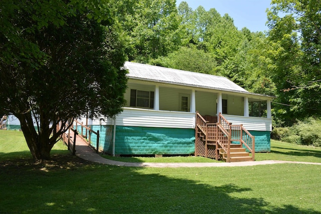 3831 Churchville Rd, Camden, WV 26338 - view of front of property with a front lawn, stairway, a porch, and a metal roof