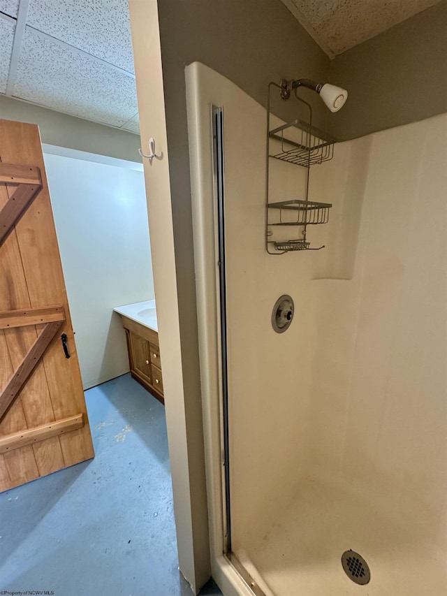 296 Old Cheat Rd, Morgantown, WV 26508 - bathroom with a stall shower, concrete flooring, and vanity