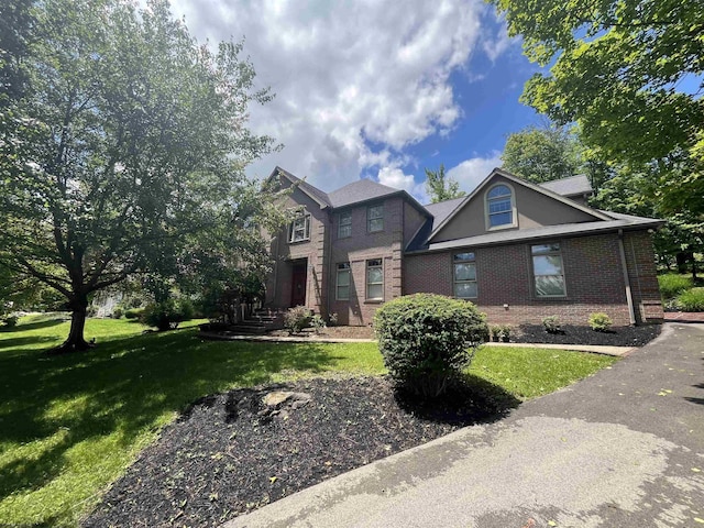 4134 Cove Point Dr, Morgantown, WV 26508 - view of front of home featuring brick siding and a front yard