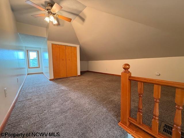 106 W Woodland Ave Unit 2, Clarksburg, WV 26301 - bonus room featuring ceiling fan, vaulted ceiling, and carpet flooring