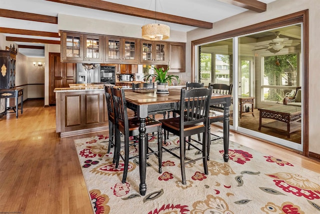 142 Vecchio Ln, Morgantown, WV 26508 - dining room featuring beam ceiling, light wood-type flooring, and ceiling fan
