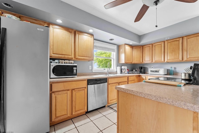 142 Vecchio Ln, Morgantown, WV 26508 - kitchen featuring stainless steel appliances, light brown cabinetry, light tile patterned floors, light countertops, and recessed lighting