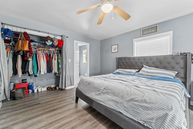 142 Vecchio Ln, Morgantown, WV 26508 - bedroom with a closet, wood finished floors, and ceiling fan