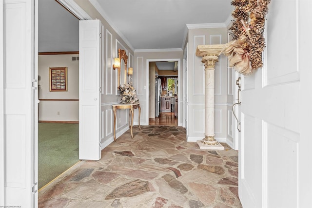 142 Vecchio Ln, Morgantown, WV 26508 - foyer featuring stone floors, ornamental molding, and light carpet