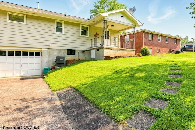 1416 Anmoore Rd, Bridgeport, WV 26330 - view of front of home featuring a front lawn, an attached garage, and concrete driveway
