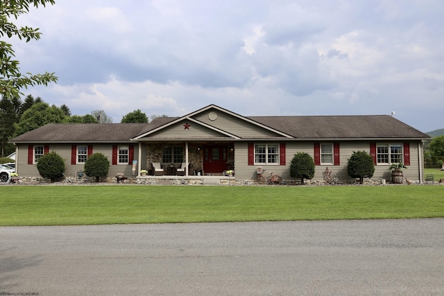 16 Greentree Ln, Elkins, WV 26241 - ranch-style home with a front yard and covered porch