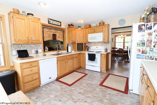 16 Greentree Ln, Elkins, WV 26241 - kitchen featuring white appliances, decorative backsplash, light countertops, a chandelier, and a textured ceiling