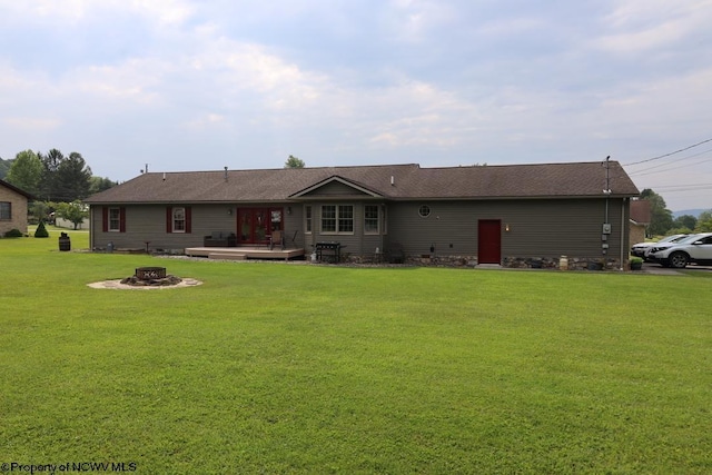 16 Greentree Ln, Elkins, WV 26241 - back of property with an outdoor fire pit, a yard, and a wooden deck