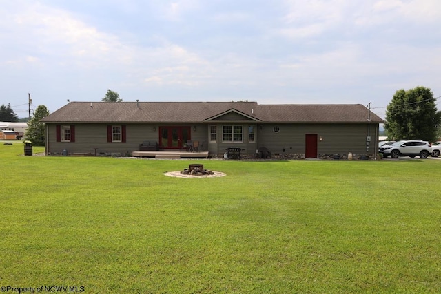 16 Greentree Ln, Elkins, WV 26241 - rear view of property featuring french doors, a fire pit, and a lawn