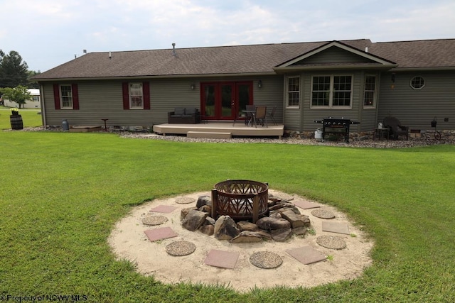 16 Greentree Ln, Elkins, WV 26241 - back of house with a fire pit, french doors, and a lawn