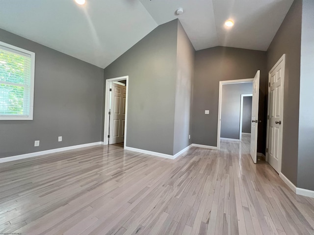 1381 Randall St, Morgantown, WV 26505 - unfurnished room featuring lofted ceiling, light wood-style flooring, and a smoke detector