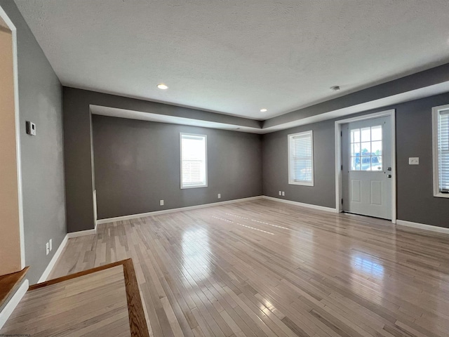 1381 Randall St, Morgantown, WV 26505 - entrance foyer with plenty of natural light, light wood-type flooring, a textured ceiling, and recessed lighting