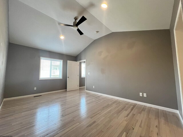 1381 Randall St, Morgantown, WV 26505 - unfurnished bedroom featuring lofted ceiling, light wood-style floors, ceiling fan, and recessed lighting