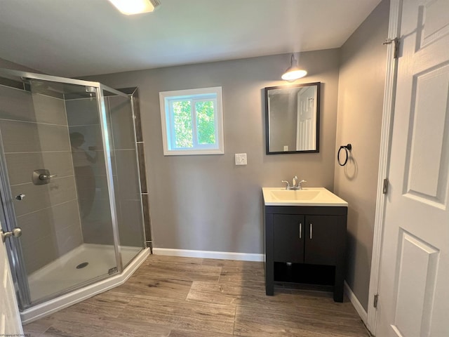 1381 Randall St, Morgantown, WV 26505 - full bath featuring vanity, a stall shower, and wood finished floors