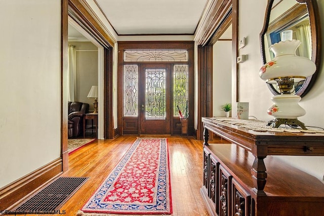 159 E Main St, Clarksburg, WV 26301 - entrance foyer featuring hardwood / wood-style flooring and ornamental molding