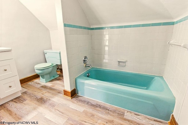 159 E Main St, Clarksburg, WV 26301 - full bath with a bathtub, lofted ceiling, wood finished floors, and vanity