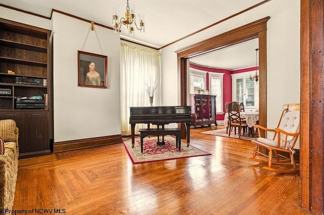 159 E Main St, Clarksburg, WV 26301 - sitting room with a chandelier, crown molding, and wood finished floors