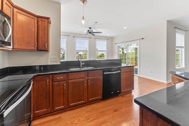 453 Blackberry Ridge Dr, Morgantown, WV 26508 - kitchen with black appliances, light wood-type flooring, ceiling fan, a peninsula, and pendant lighting