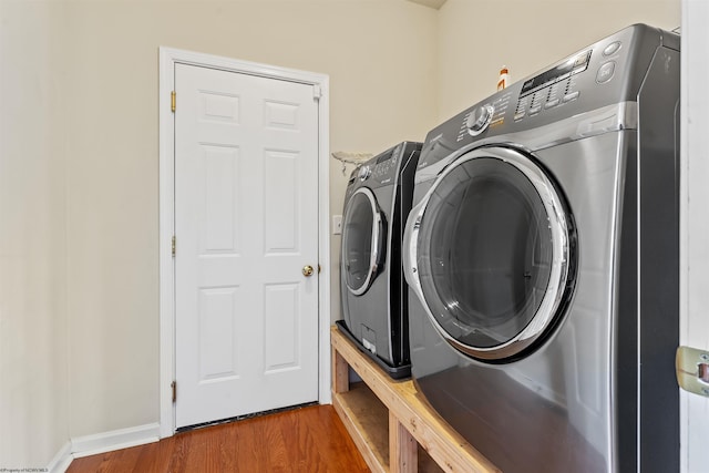 453 Blackberry Ridge Dr, Morgantown, WV 26508 - laundry area featuring separate washer and dryer and wood finished floors