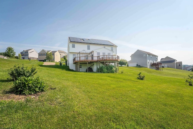 453 Blackberry Ridge Dr, Morgantown, WV 26508 - rear view of property featuring a deck, a lawn, and a residential view