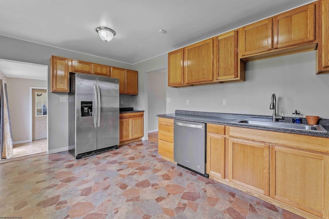 48 Skyline Dr, Morgantown, WV 26508 - kitchen with stainless steel appliances, stone finish floors, dark countertops, and brown cabinets