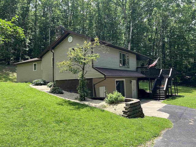 60 Saras Way, Beverly, WV 26253 - view of front of home with stairway, a front yard, a deck, and a chimney