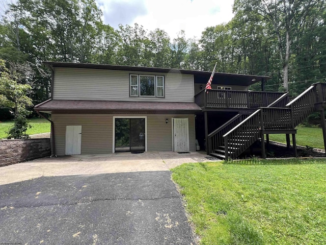 60 Saras Way, Beverly, WV 26253 - view of front of home featuring stairs, a front lawn, a wooden deck, and a patio