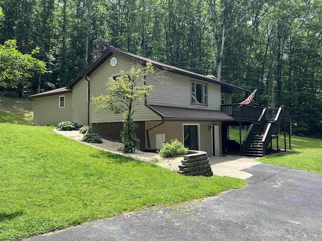 60 Saras Way, Beverly, WV 26253 - view of front of property featuring stairway, a wooden deck, a front lawn, a chimney, and asphalt driveway