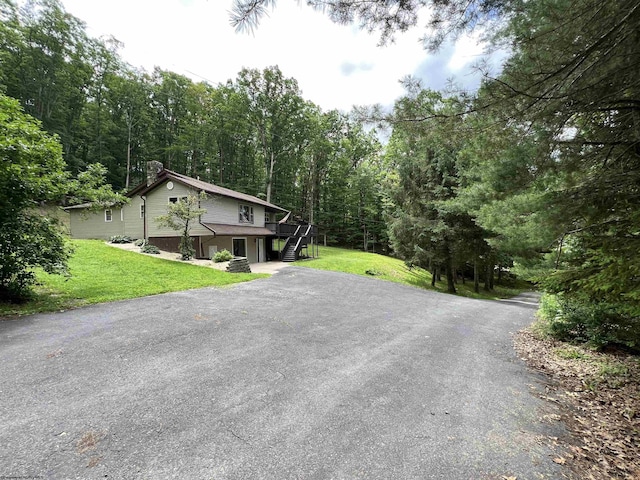 60 Saras Way, Beverly, WV 26253 - view of asphalt driveway featuring stairway and a view of trees