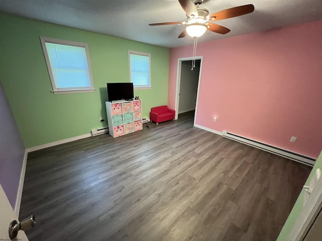 60 Saras Way, Beverly, WV 26253 - unfurnished living room with a baseboard heating unit, ceiling fan, and wood finished floors