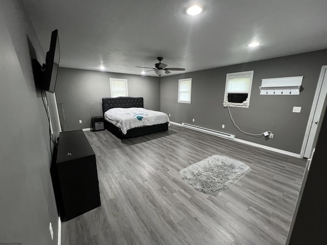 60 Saras Way, Beverly, WV 26253 - bedroom with a baseboard heating unit, wood finished floors, recessed lighting, and ceiling fan