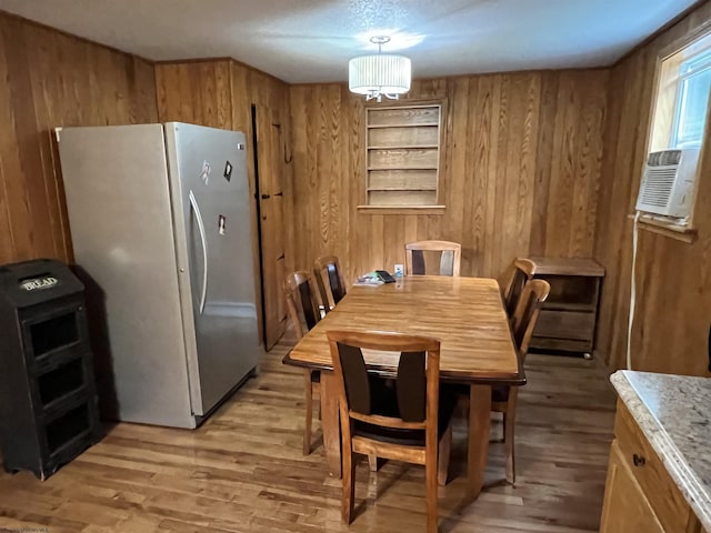 60 Saras Way, Beverly, WV 26253 - dining area with wooden walls, light wood finished floors, a chandelier, and cooling unit