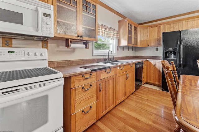 2228 Dinnerbell Five Forks Rd, Farmington, PA 15437 - kitchen with white appliances, light wood-style flooring, and glass insert cabinets