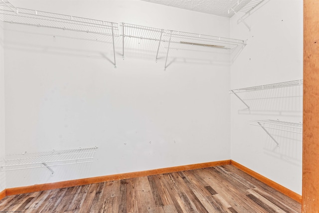2228 Dinnerbell Five Forks Rd, Farmington, PA 15437 - walk in closet with wood finished floors