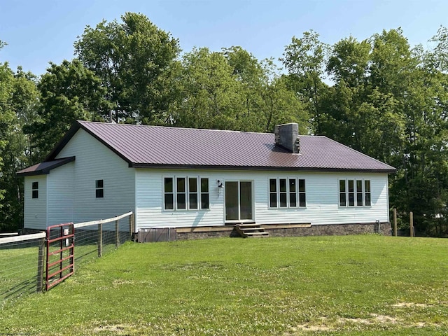 2214 Fairview Rd, Independence, WV 26374 - view of front of home featuring entry steps, a metal roof, and a chimney