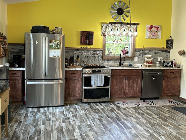 2214 Fairview Rd, Independence, WV 26374 - kitchen featuring stainless steel appliances, light wood-style floors, backsplash, and light countertops