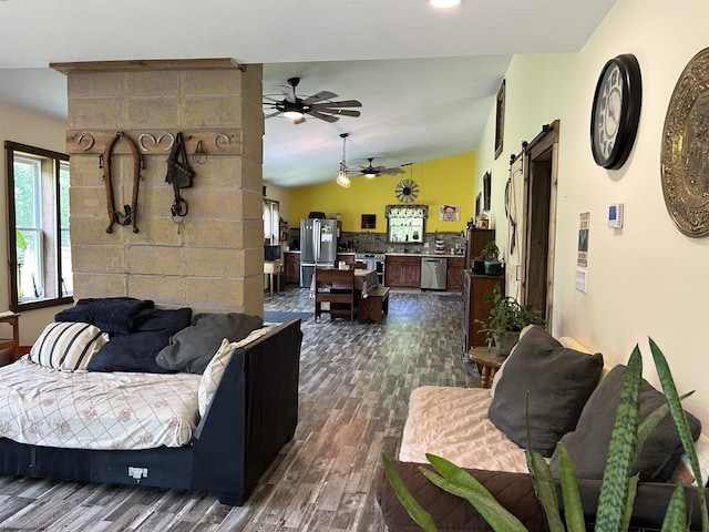 2214 Fairview Rd, Independence, WV 26374 - living room featuring a barn door, ceiling fan, dark wood-style floors, and lofted ceiling