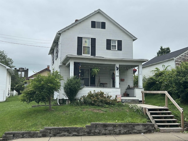 374 Dunkard Ave, Morgantown, WV 26501 - view of front of house featuring covered porch and a front yard